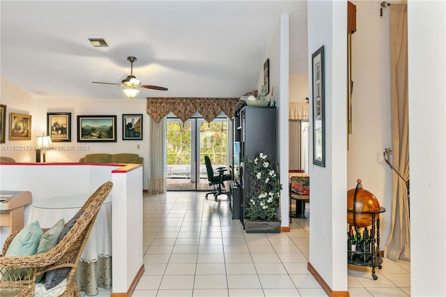 corridor featuring light tile patterned flooring