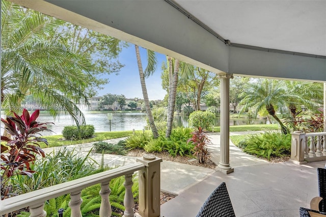 view of patio featuring a water view