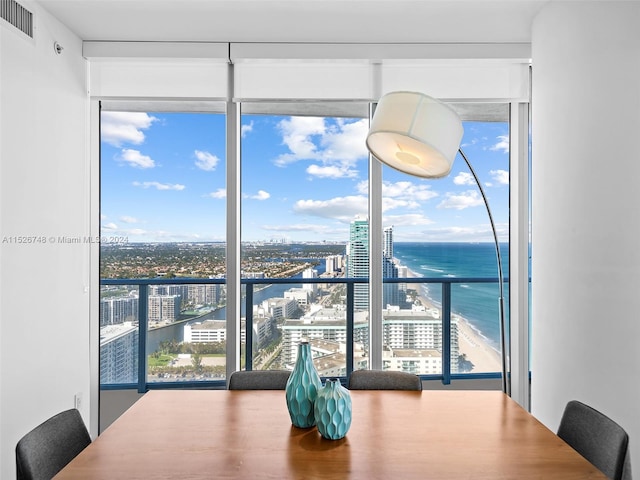 dining space with a water view