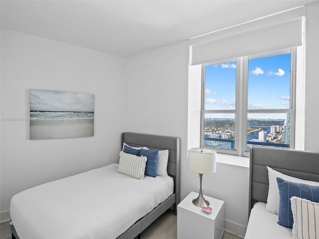 bedroom with hardwood / wood-style flooring