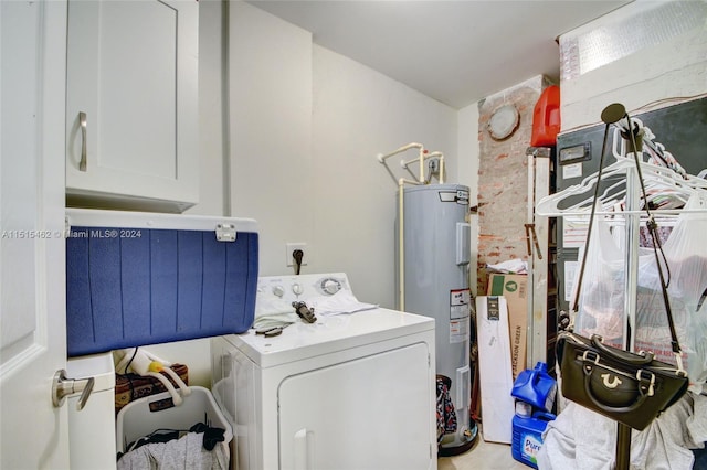 clothes washing area with electric water heater and washer / dryer