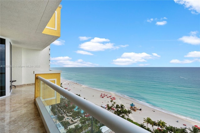 view of water feature with a beach view