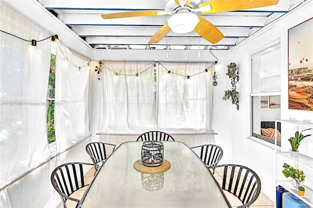 dining space featuring ceiling fan