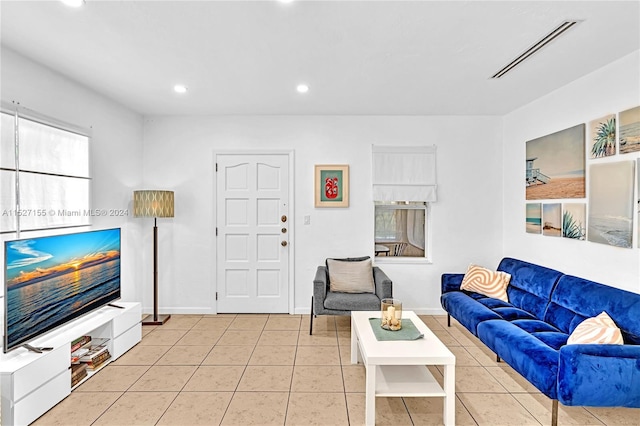 living room with light tile floors