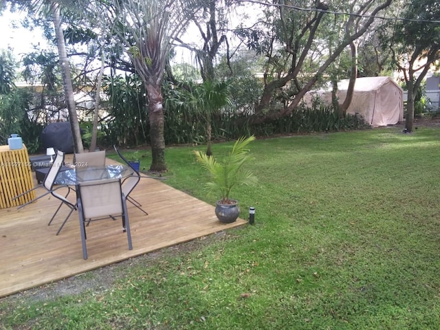 view of yard featuring a deck