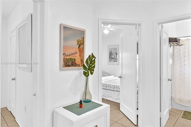 corridor with light tile flooring