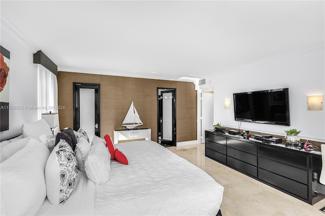 bedroom with ornamental molding