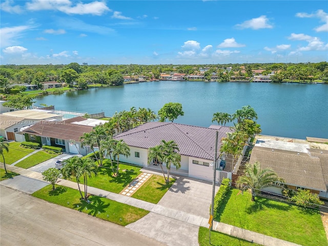 birds eye view of property featuring a water view