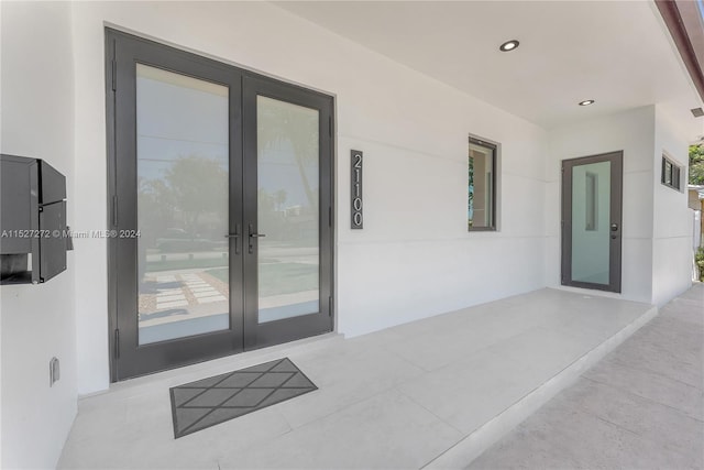 entrance to property featuring french doors