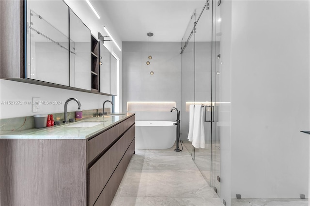 bathroom featuring separate shower and tub, tile floors, and vanity