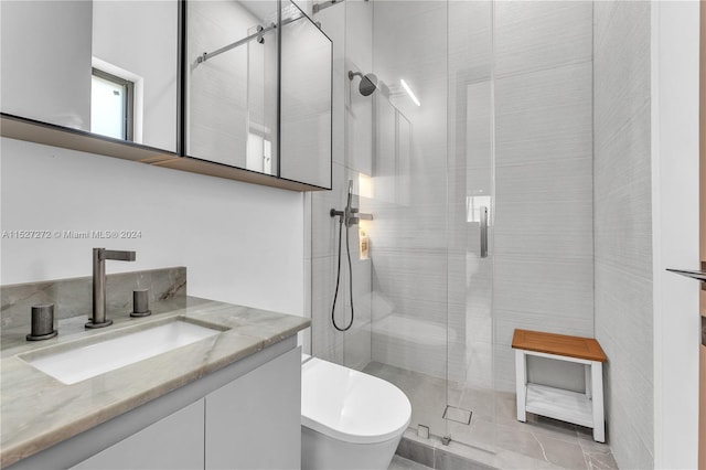 bathroom featuring vanity, tile flooring, and a shower with shower door