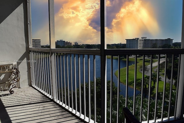 view of balcony at dusk