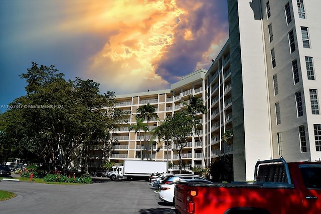 view of outdoor building at dusk