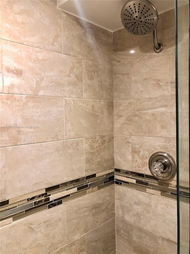 room details with a tile shower