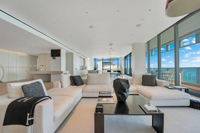 living room with expansive windows and wood-type flooring