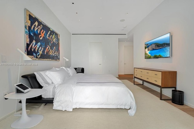 bedroom with light hardwood / wood-style flooring