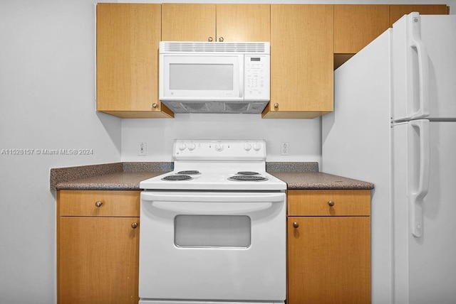 kitchen featuring white appliances