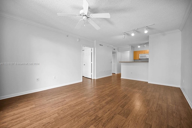 unfurnished living room featuring a textured ceiling, ceiling fan, ornamental molding, and wood-type flooring