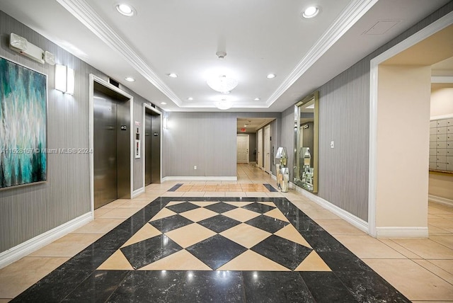 hallway with a tray ceiling, crown molding, elevator, and light tile patterned floors