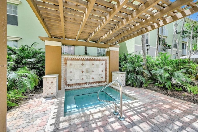 view of swimming pool featuring a pergola and a patio area