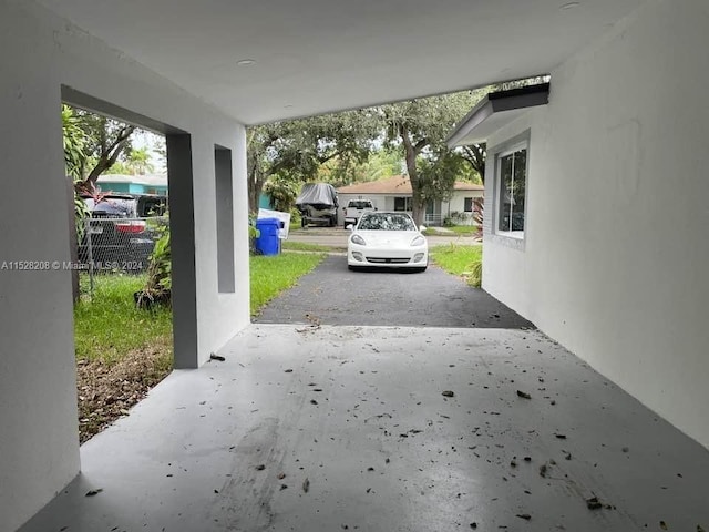 view of patio / terrace featuring a carport