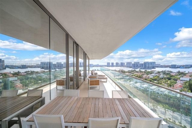 balcony featuring a water view