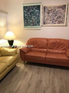 living room featuring hardwood / wood-style flooring