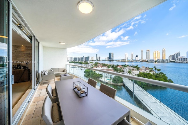 balcony featuring a water view