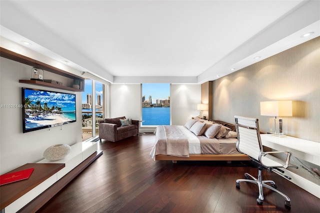 bedroom with dark wood-type flooring