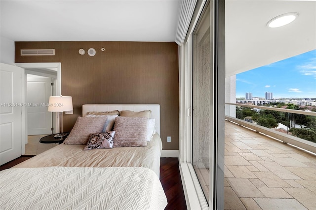 bedroom featuring hardwood / wood-style floors