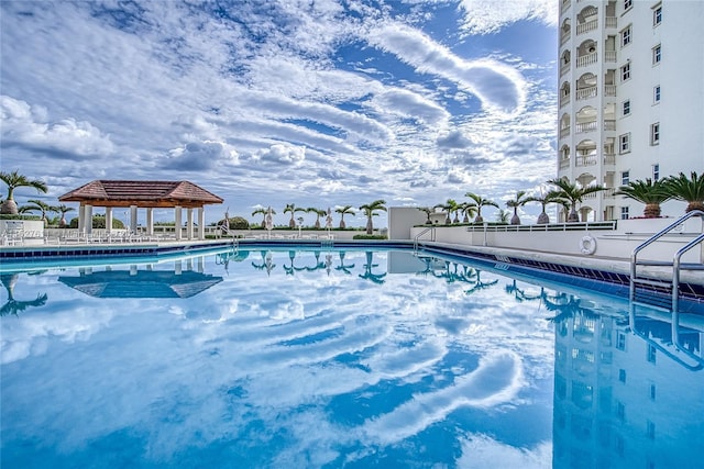 view of swimming pool featuring a gazebo