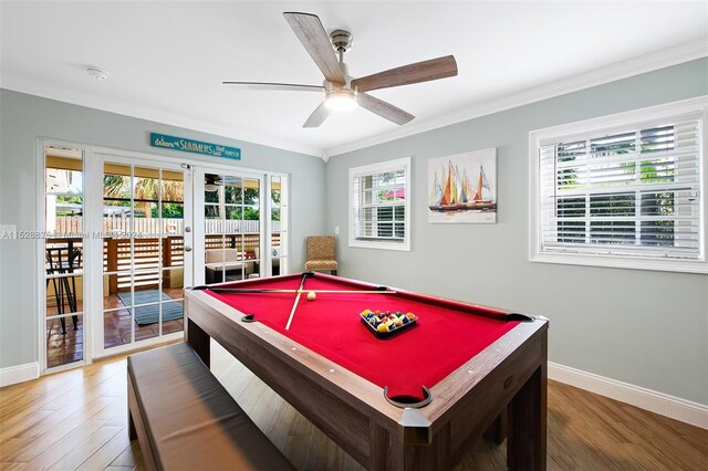 game room featuring plenty of natural light, dark wood-type flooring, ceiling fan, and pool table