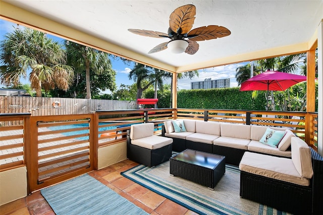 wooden terrace featuring an outdoor hangout area