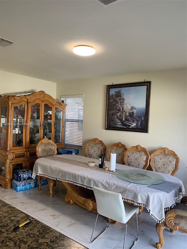 living room featuring light tile flooring