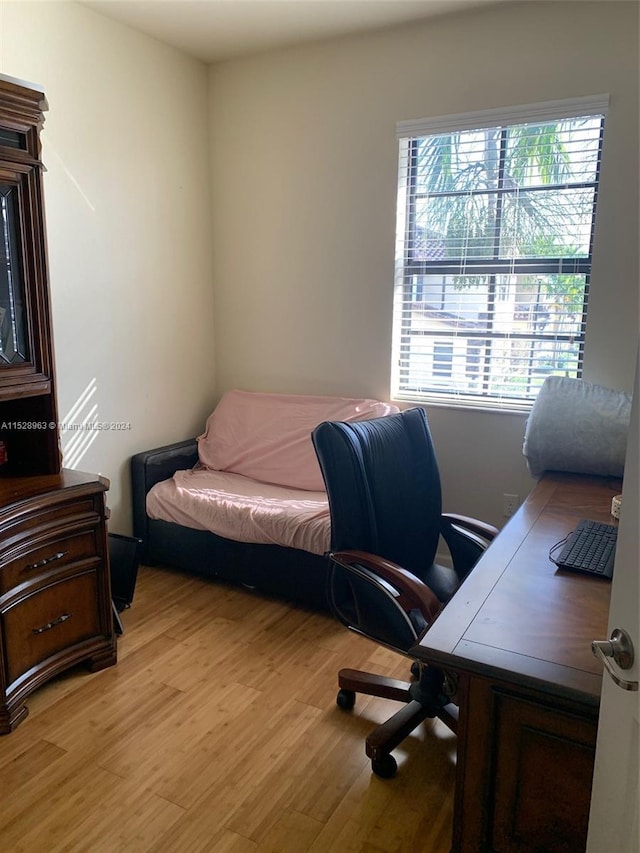 bedroom featuring light hardwood / wood-style floors