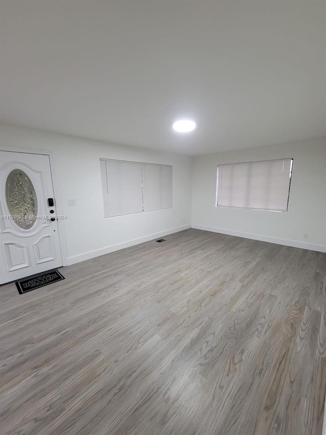 foyer entrance featuring light wood-type flooring