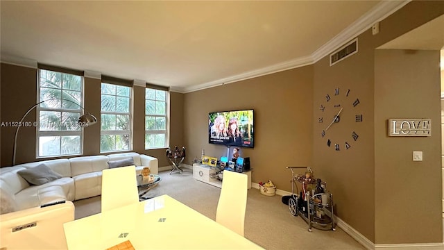 interior space with light carpet and ornamental molding