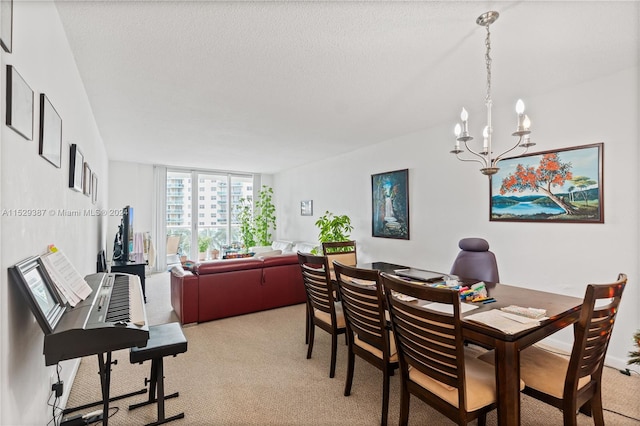 carpeted dining area with an inviting chandelier and a textured ceiling