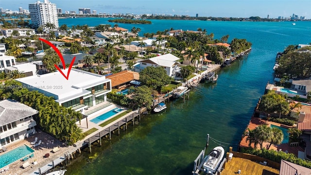 drone / aerial view with a water view