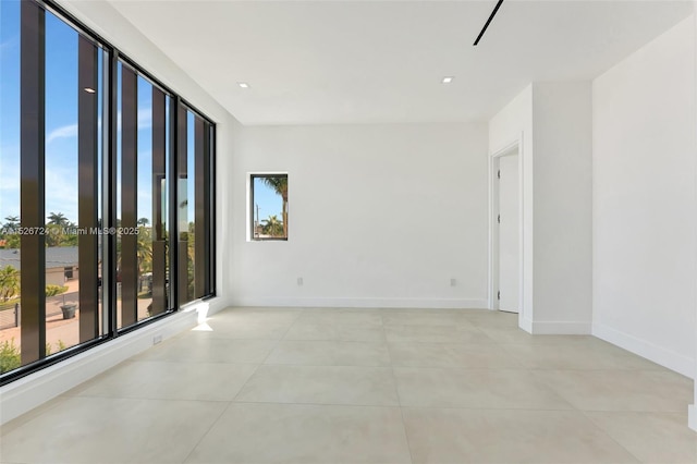 empty room featuring light tile patterned flooring