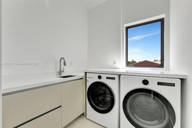 washroom featuring sink and washing machine and clothes dryer