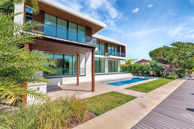 rear view of house with a patio area