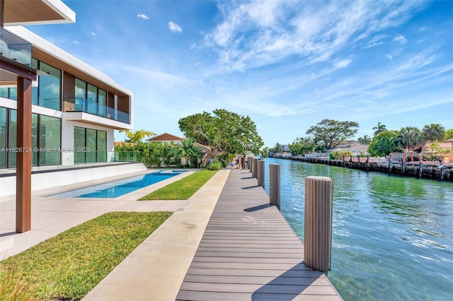 dock area featuring a water view