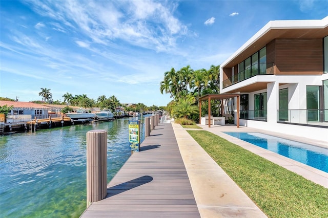 dock area with a water view