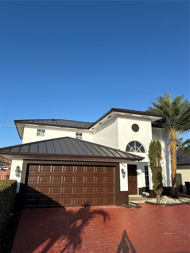 view of front of house with a garage