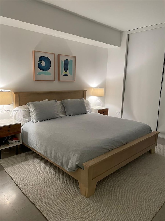 bedroom featuring hardwood / wood-style flooring