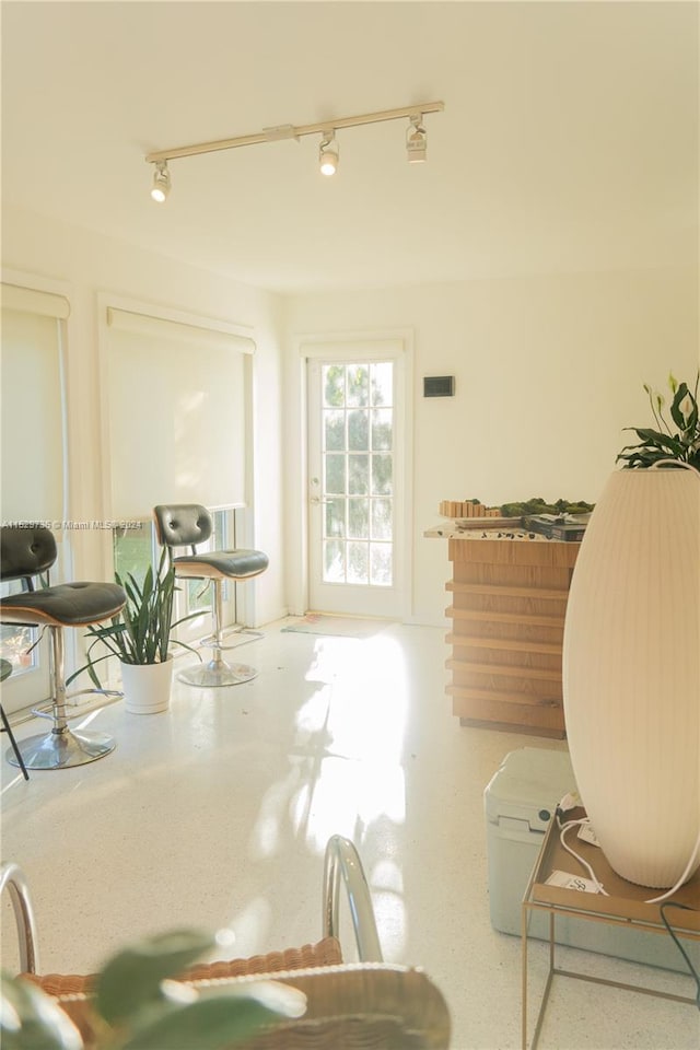 interior space featuring track lighting