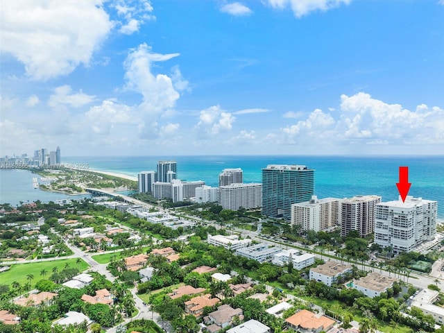 birds eye view of property featuring a water view