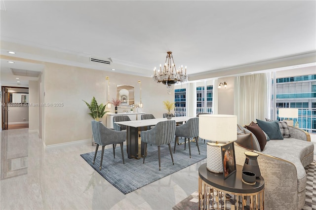 dining area with a chandelier