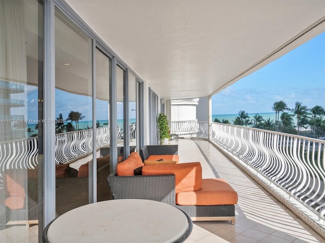 balcony featuring a water view